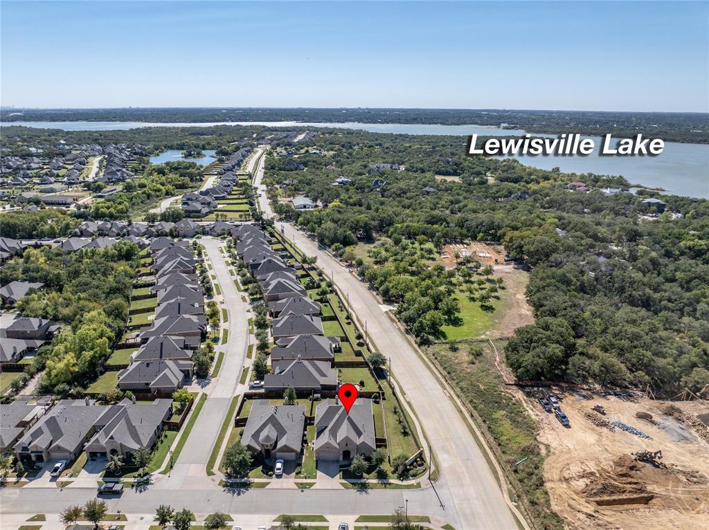 216 Equestrian Road Hickory Creek, TX 75065 - Photo 25 of 26 a view of a city from a balcony