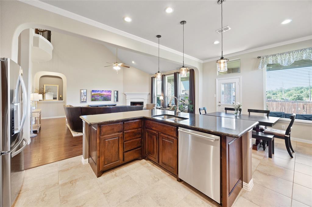 216 Equestrian Road Hickory Creek, TX 75065 - Photo 9 of 26 a kitchen with counter top space appliances and a window