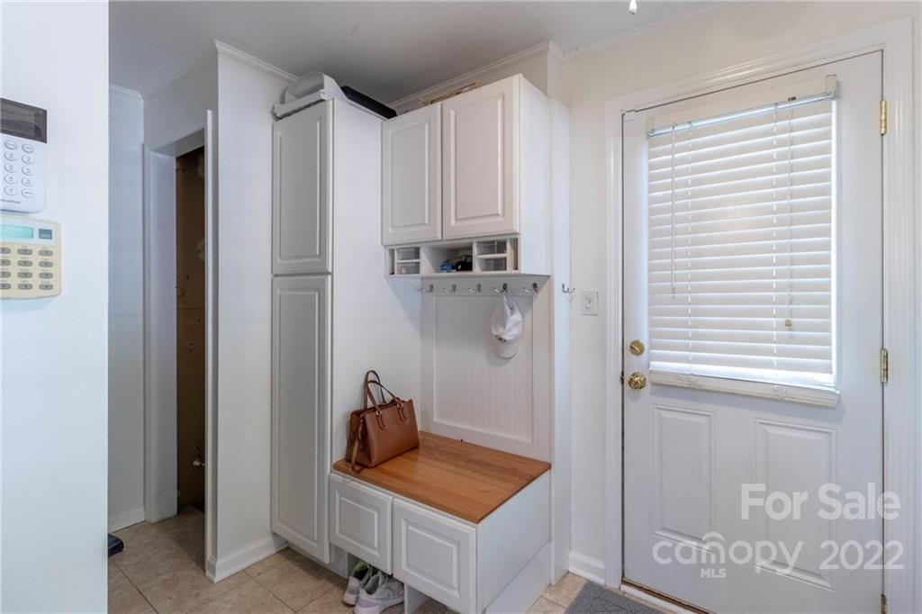 3722 Sulkirk Road Charlotte, NC 28210 - Photo 14 of 37 a room with cabinets and a window