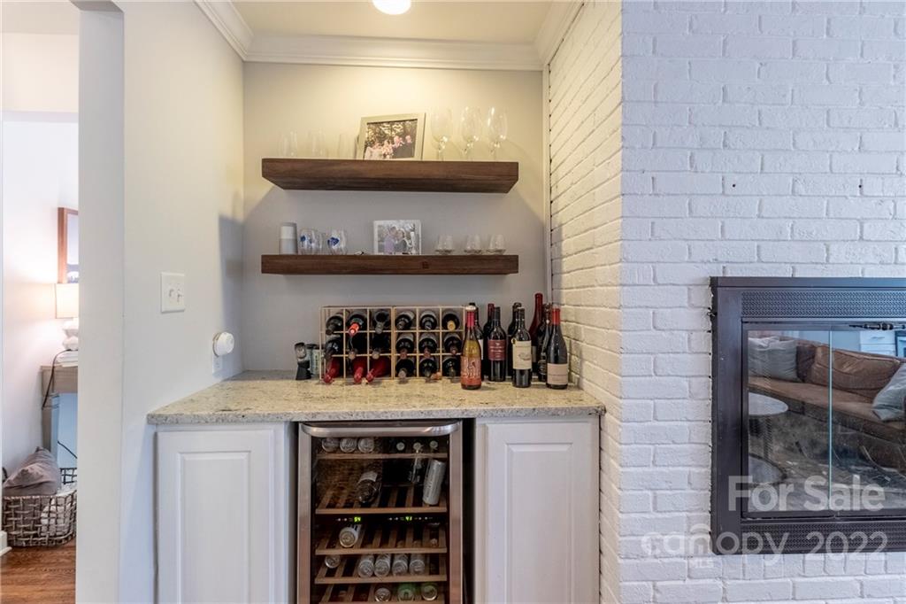 3722 Sulkirk Road Charlotte, NC 28210 - Photo 20 of 37 a kitchen with a stove and cabinets