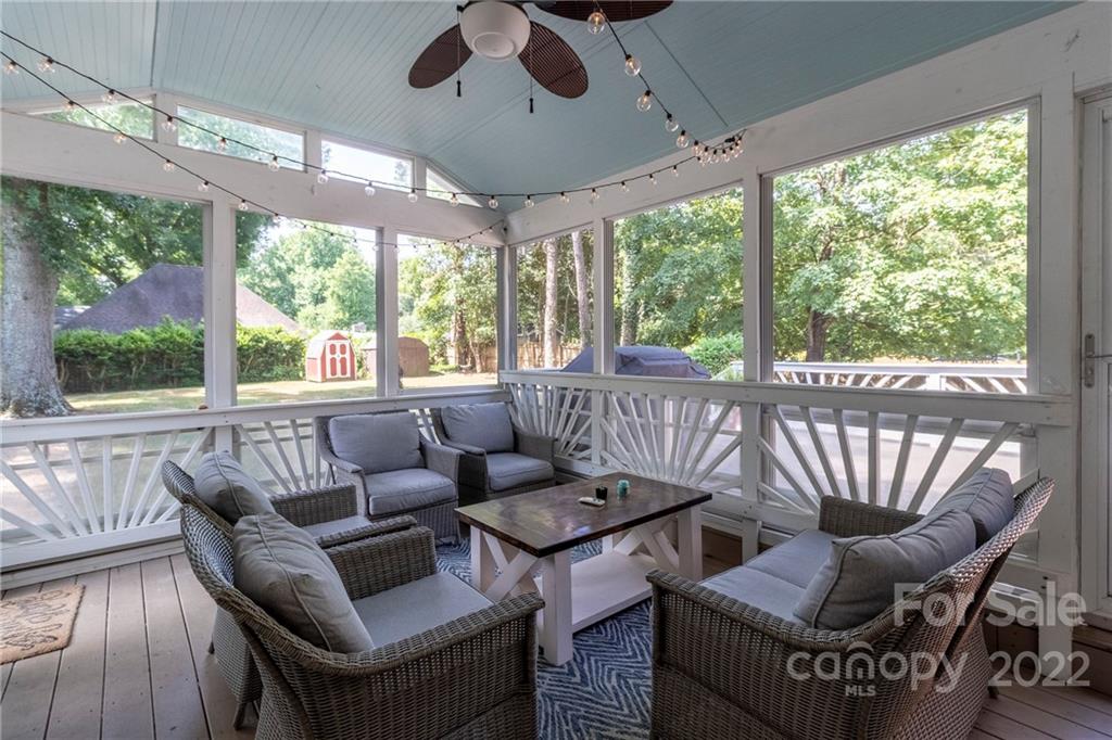3722 Sulkirk Road Charlotte, NC 28210 - Photo 27 of 37 a living room with furniture and a large window