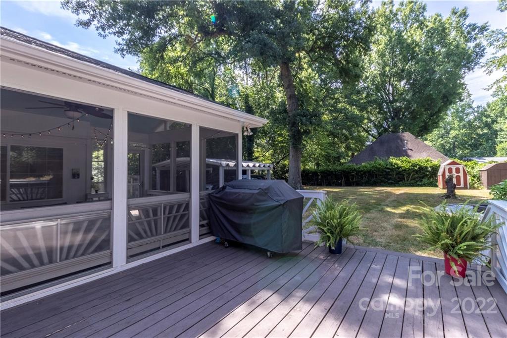 3722 Sulkirk Road Charlotte, NC 28210 - Photo 31 of 37 a view of a backyard with sitting area and garden