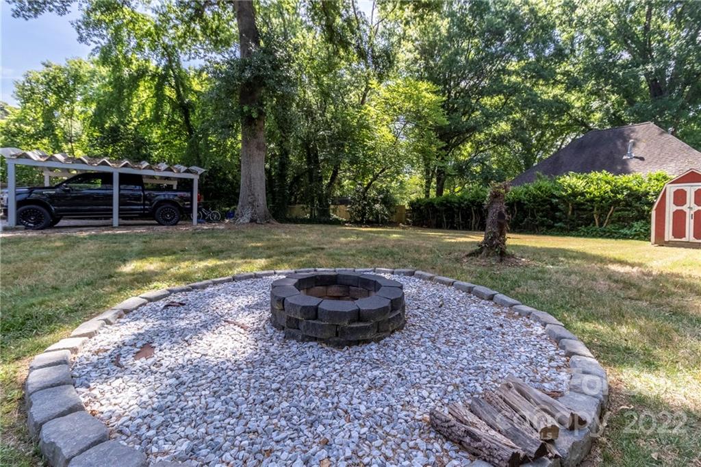 3722 Sulkirk Road Charlotte, NC 28210 - Photo 33 of 37 a view of a backyard with swimming pool