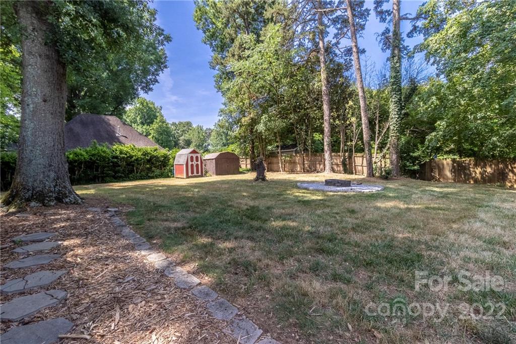 3722 Sulkirk Road Charlotte, NC 28210 - Photo 34 of 37 a view of outdoor space with trees all around