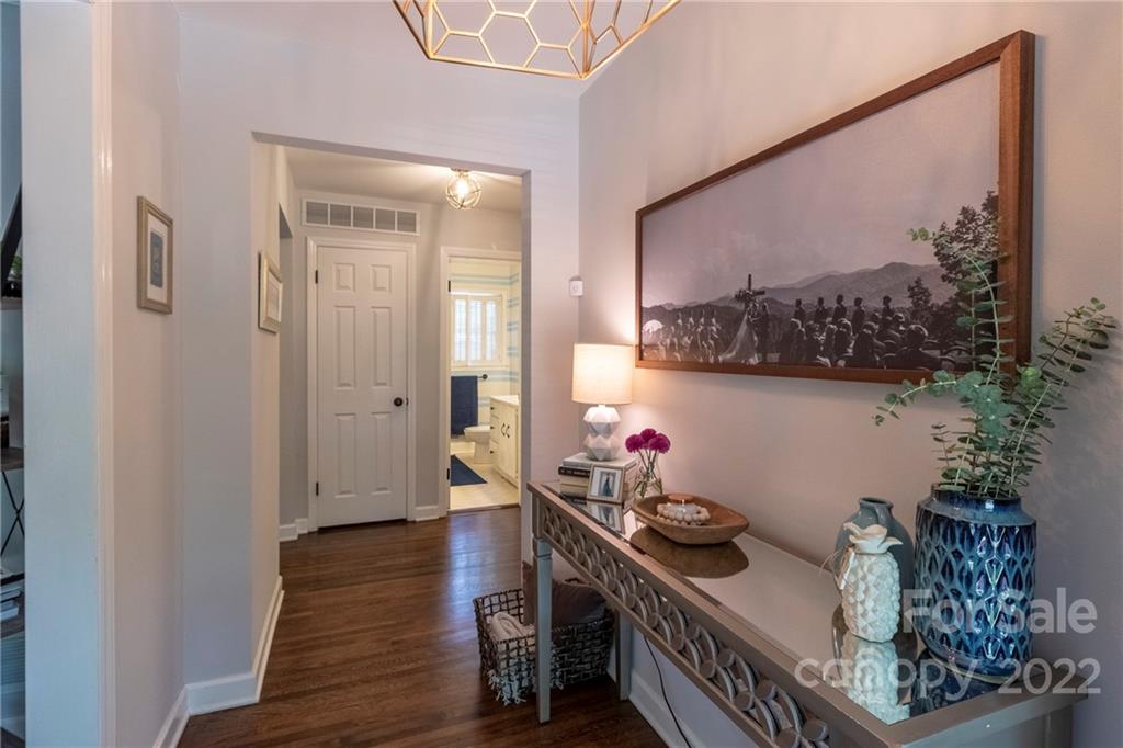 3722 Sulkirk Road Charlotte, NC 28210 - Photo 4 of 37 a room with furniture and wooden floor