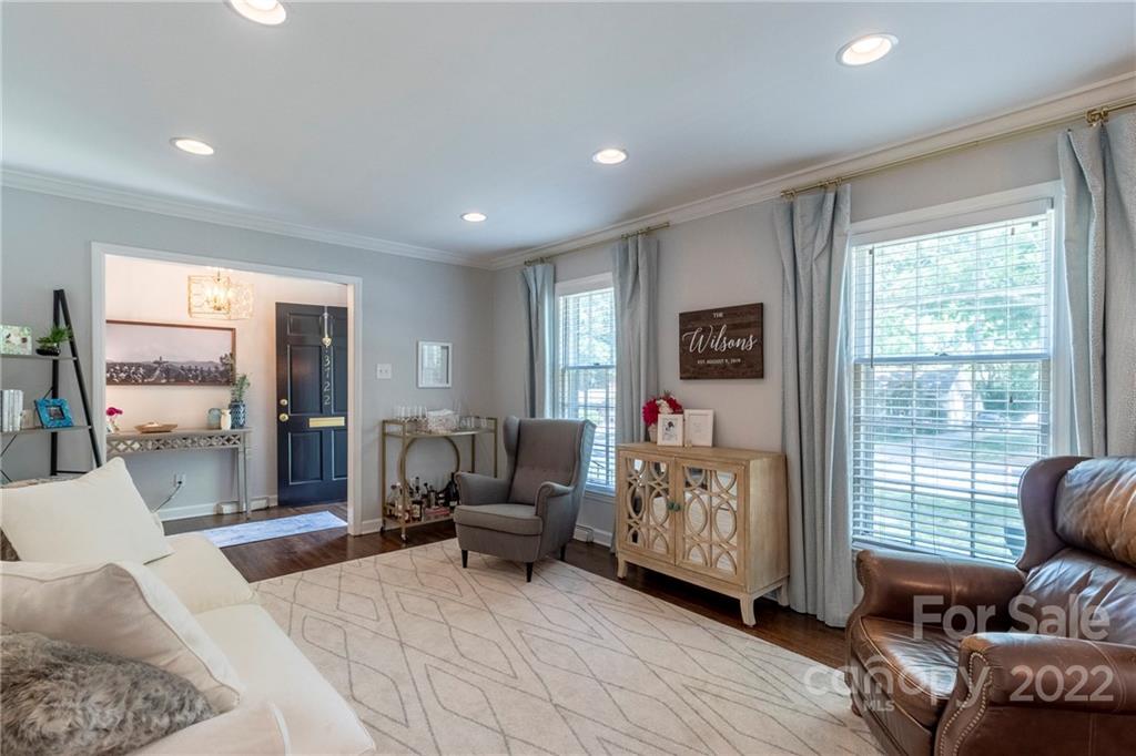 3722 Sulkirk Road Charlotte, NC 28210 - Photo 7 of 37 a living room with furniture window and wooden floor