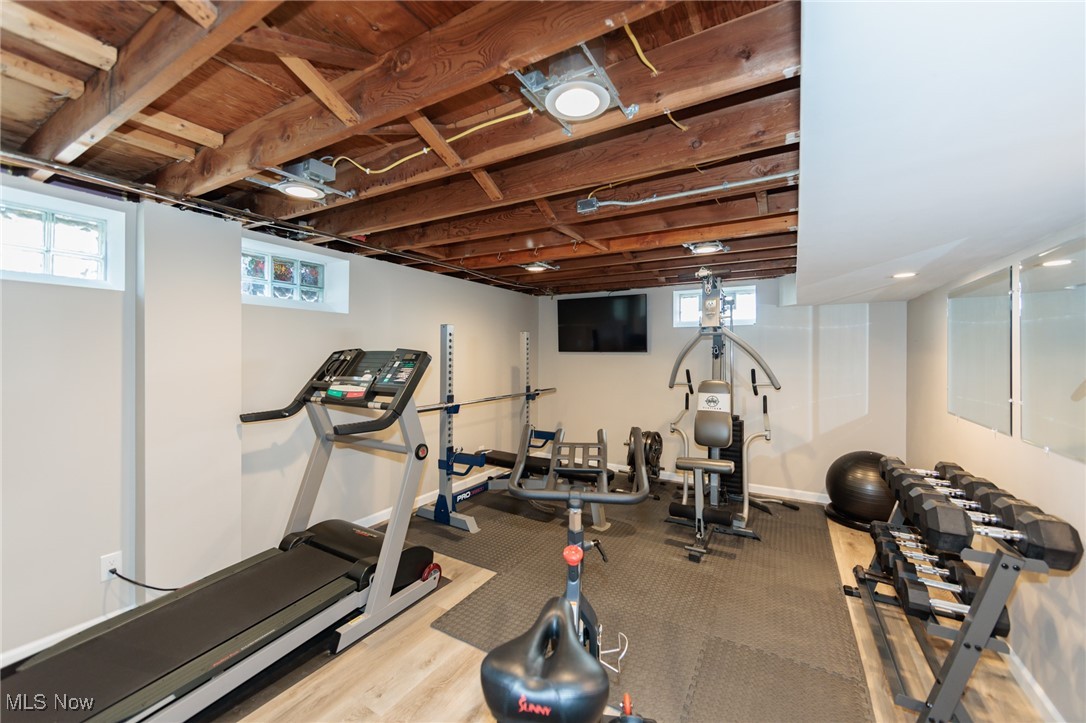 7316 Oakwood Road Parma, OH 44130 - Photo 28 of 41 Workout area featuring light wood finished floors and baseboards
