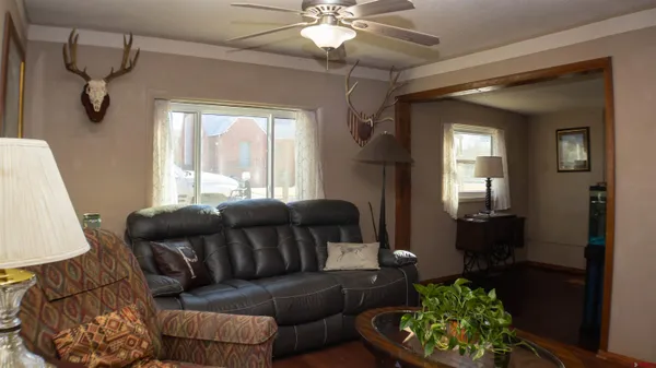 a living room with furniture and a window