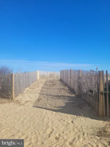 a view of a backyard of the house