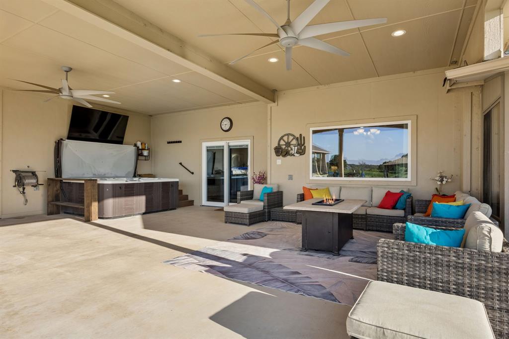 174 King Ranch Court Fort Worth, TX 76108 - Photo 33 of 40 Covered Patio with plenty of seating and separate spa.