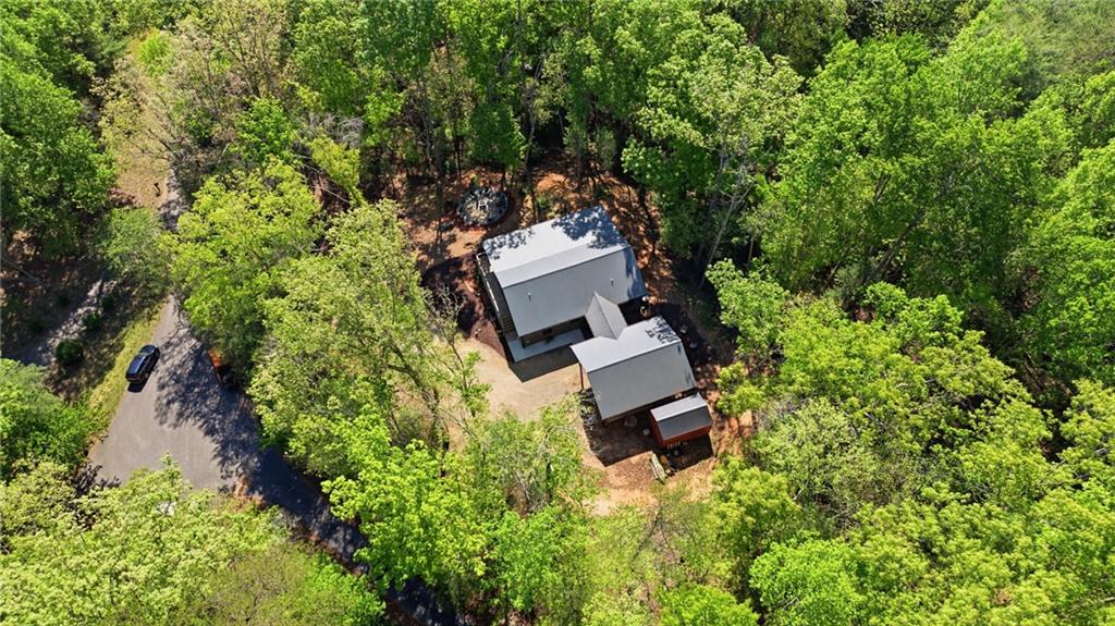 191 Oakwood Road Blairsville, GA 30512 - Photo 39 of 43 an aerial view of a house with outdoor space and trees all around