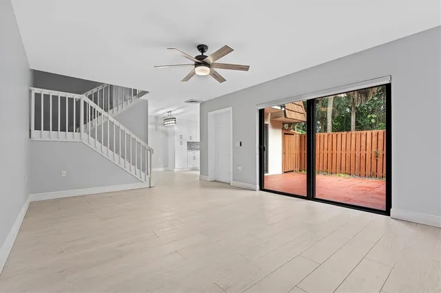 a view of a livingroom with a staircase