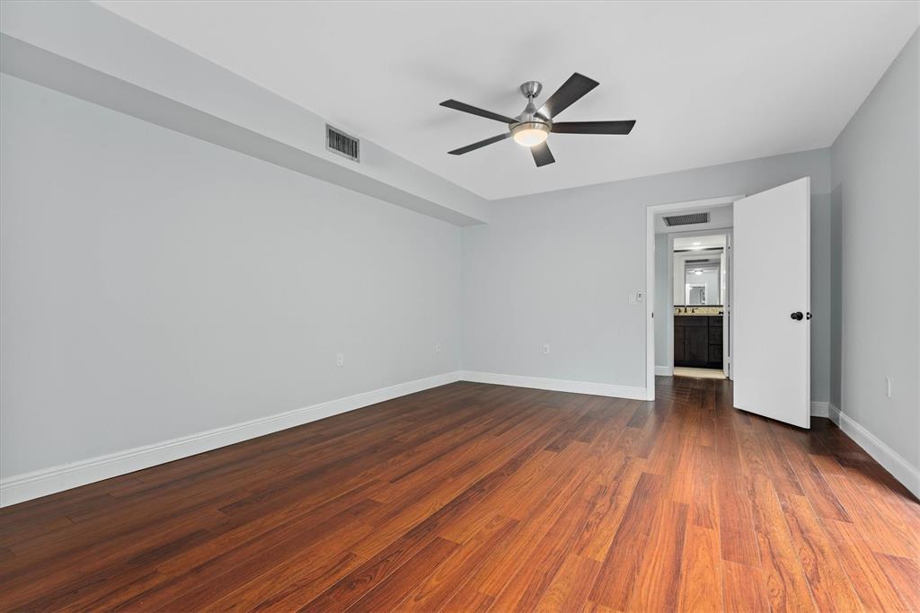 9156 Southwest 23rd Street, Unit D Davie, FL 33324 - Photo 24 of 35 a view of empty room with wooden floor and window