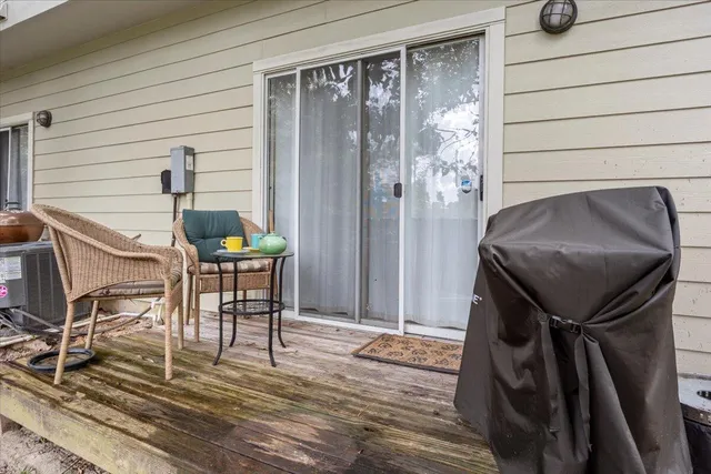 a view of kitchen with furniture and wooden floor