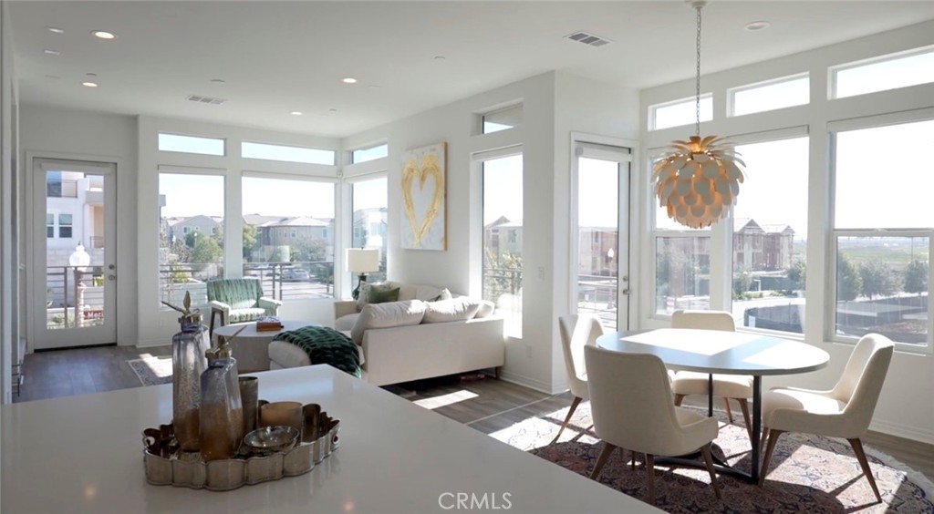 201 Merit Irvine, CA 92618 - Photo 2 of 8 a living room with furniture and a large window
