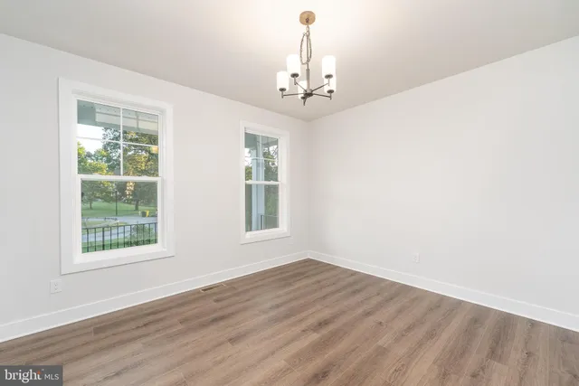 a bathroom with a sink toilet a shower and a mirror