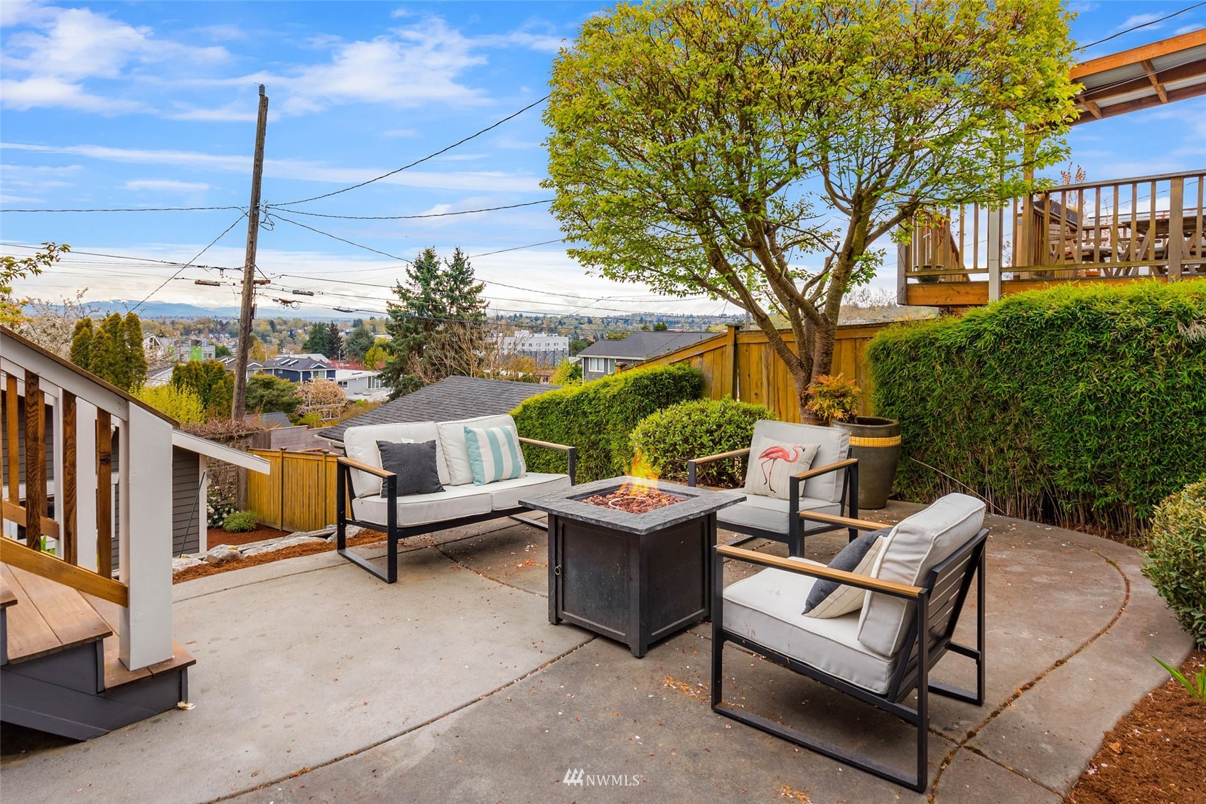 4110 38th Avenue Southwest Seattle, WA 98126 - Photo 18 of 29 a view of a terrace with couches and wooden fence