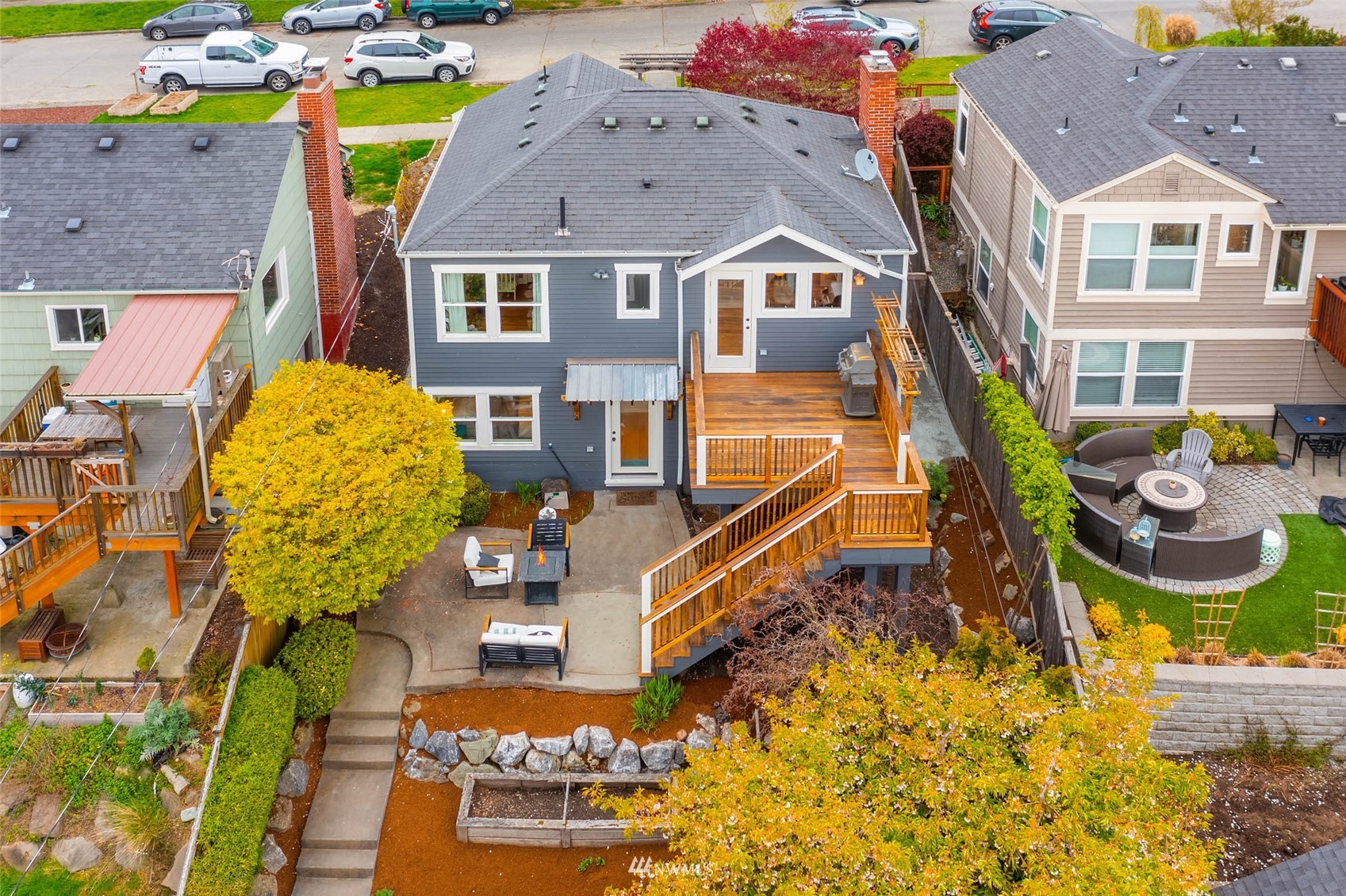 4110 38th Avenue Southwest Seattle, WA 98126 - Photo 3 of 29 an aerial view of a house with a swimming pool