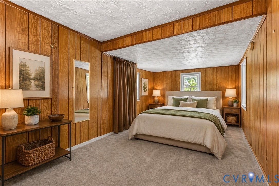 2097 Coles Point Road Hague, VA 22469 - Photo 12 of 34 a bedroom with a bed and a window