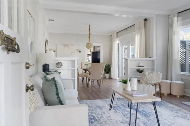 a living room with furniture and a table