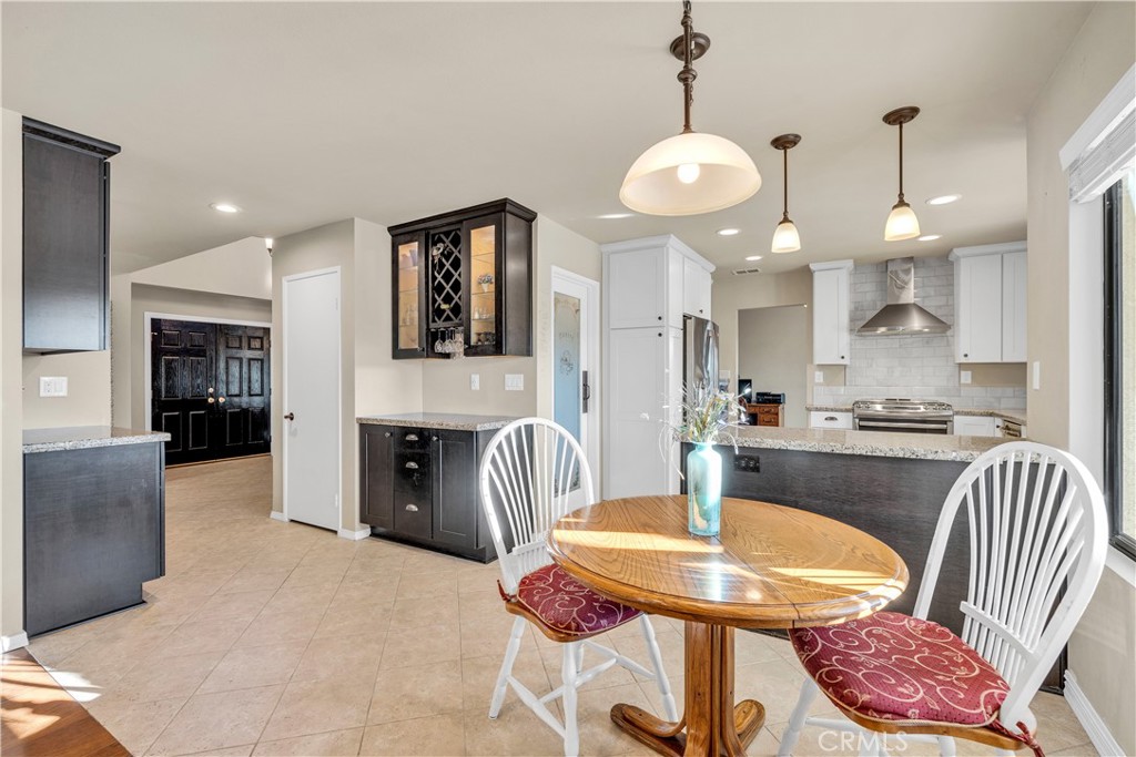 21390 Vía Del Parque Yorba Linda, CA 92887 - Photo 17 of 42 a dining room with furniture and window