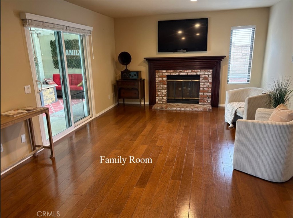 21390 Vía Del Parque Yorba Linda, CA 92887 - Photo 18 of 42 a living room with furniture and a fireplace