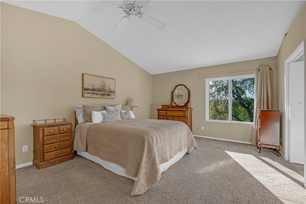 21390 Vía Del Parque Yorba Linda, CA 92887 - Photo 22 of 42 a bedroom with a bed and a chair