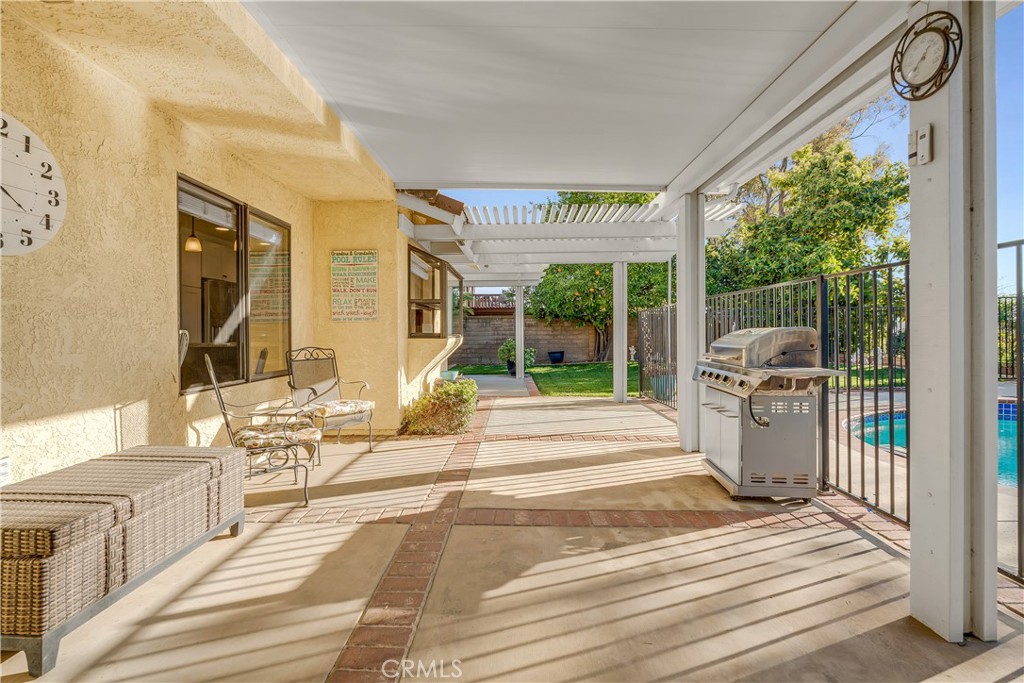 21390 Vía Del Parque Yorba Linda, CA 92887 - Photo 33 of 42 a view of a living room and a floor to ceiling window