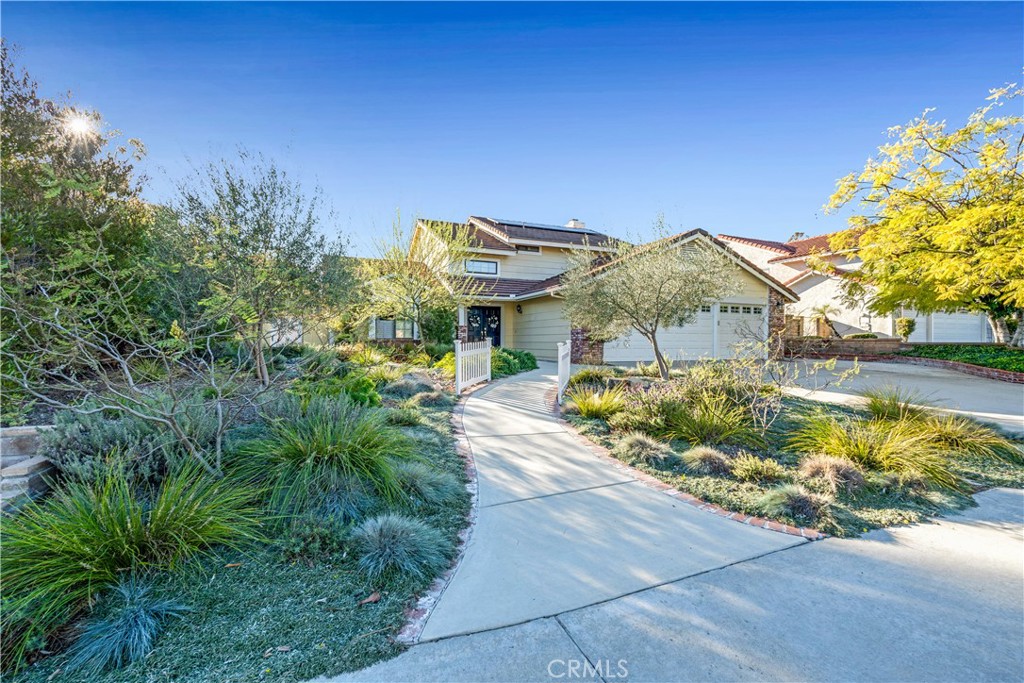 21390 Vía Del Parque Yorba Linda, CA 92887 - Photo 40 of 42 a front view of a house with a yard