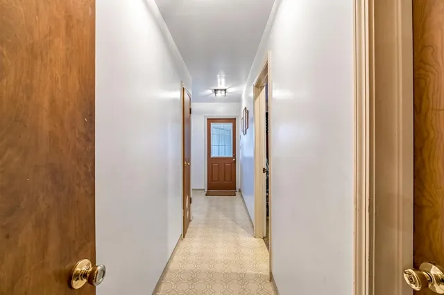 a bathroom with a sink a vanity and a mirror