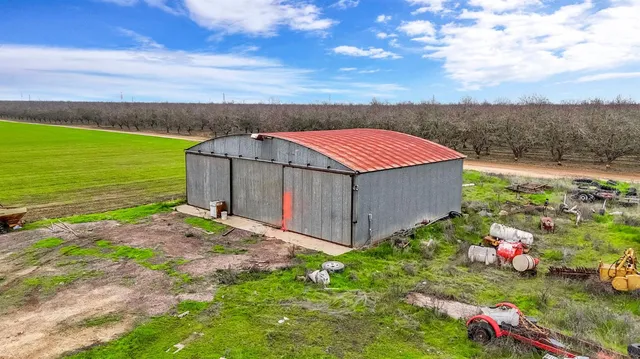 a view of a yard with an ocean