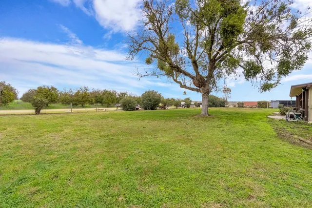 a view of a lake with beach