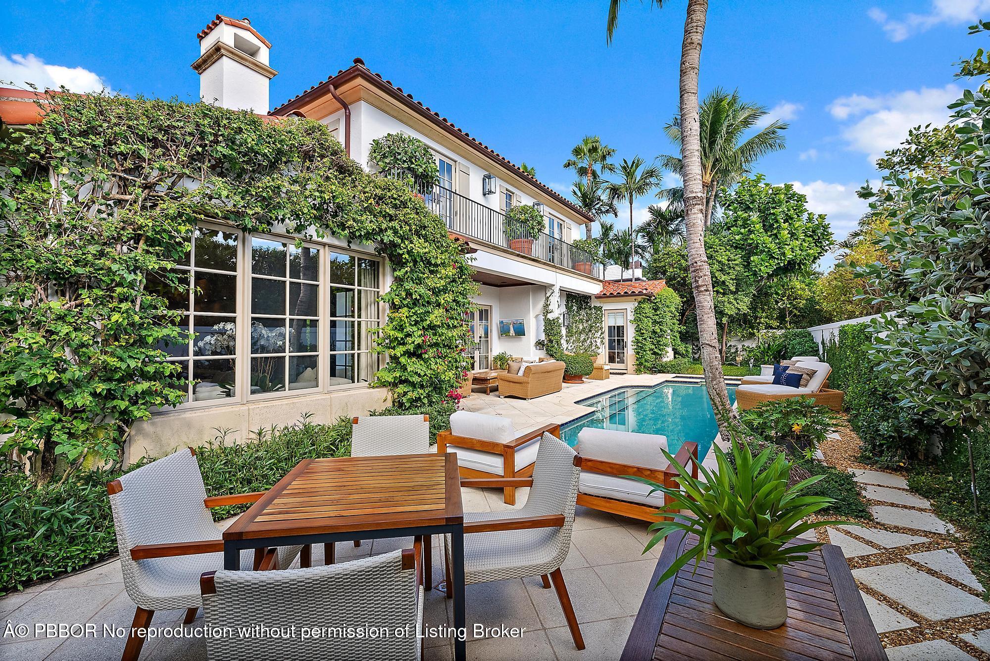 234 Ridgeview Drive Palm Beach, FL 33480 - Photo 5 of 20 a view of a house with backyard and sitting area