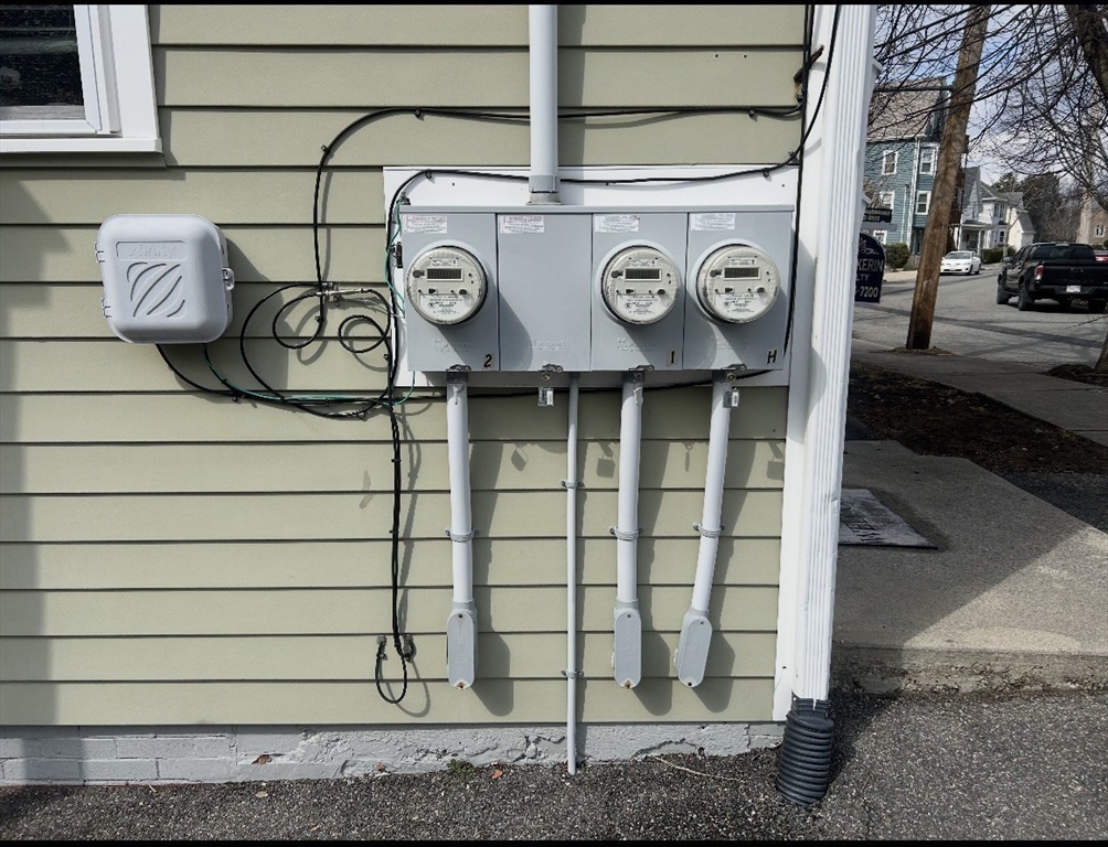 17 Proctor Street Peabody, MA 01960 - Photo 9 of 13 a view of a door and a street sign