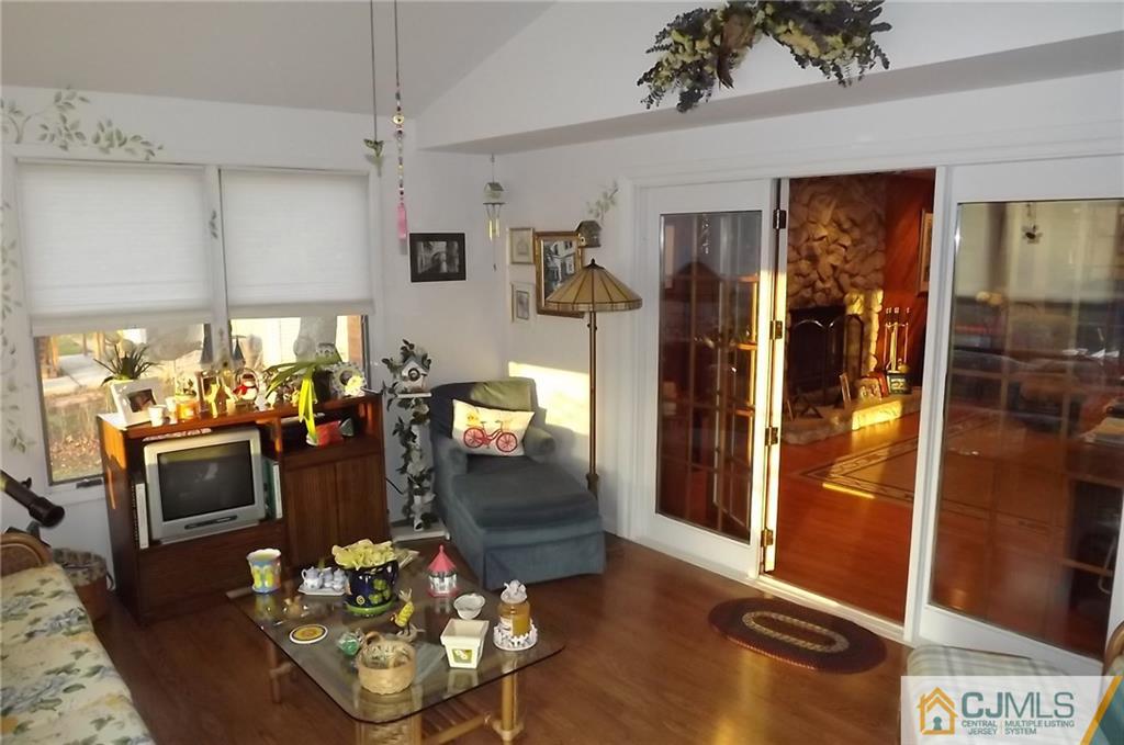 93 Magnolia Road Iselin, NJ 08830 - Photo 13 of 25 a living room with furniture