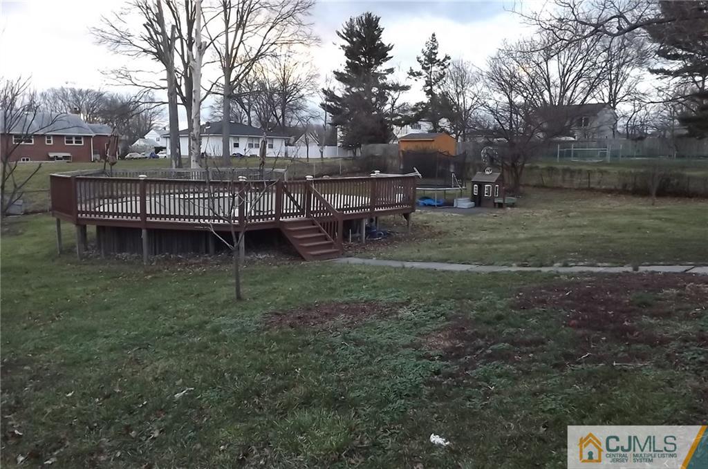 93 Magnolia Road Iselin, NJ 08830 - Photo 24 of 25 a view of a house with a yard porch and sitting area