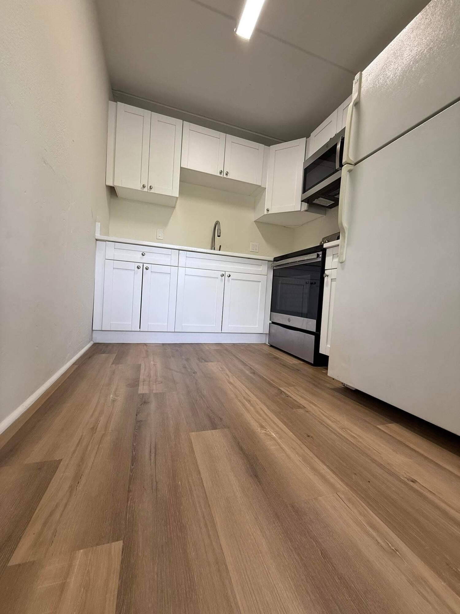 2000 Springdale Boulevard, Unit 204 Palm Springs, FL 33461 - Photo 5 of 26 3A525101-1F6C-48F4-9EAB-B4E501422BEE