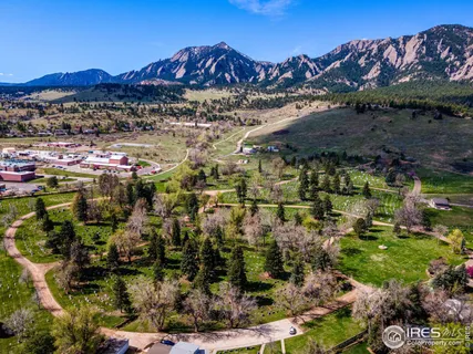 a view of a town with mountains in the background