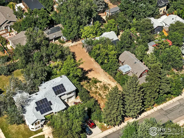 an aerial view of house with yard
