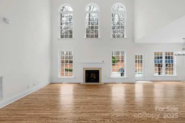 a view of a livingroom with wooden floor