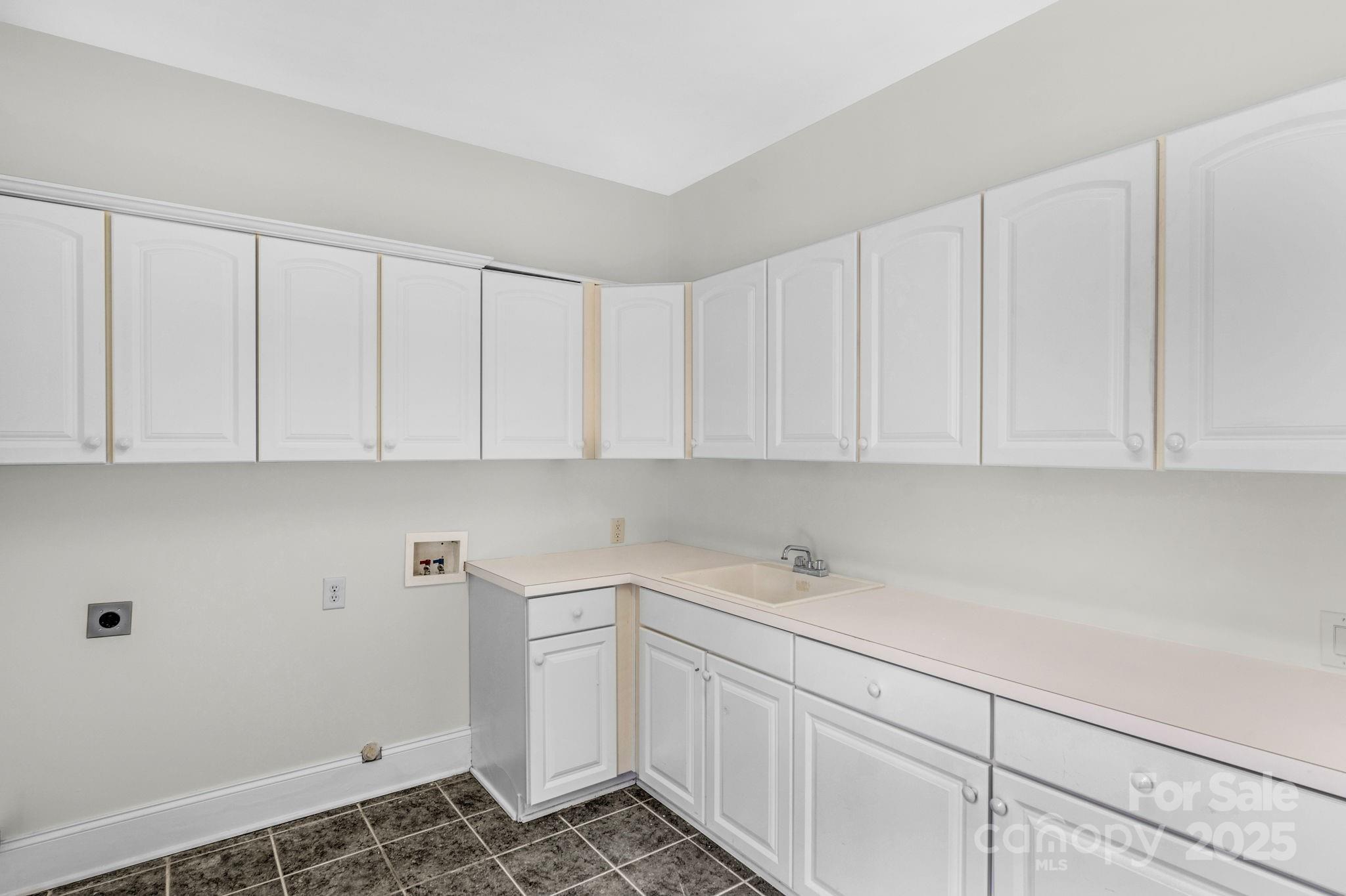 1300 Longleaf Court Weddington, NC 28104 - Photo 19 of 48 a room with cabinets