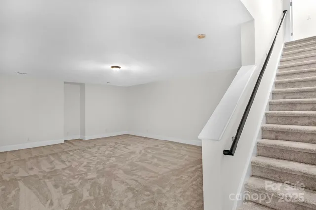 a view of empty room with windows