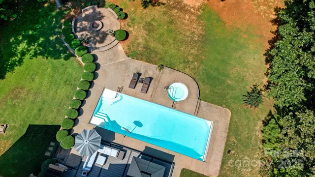 an outdoor space with furniture and umbrella