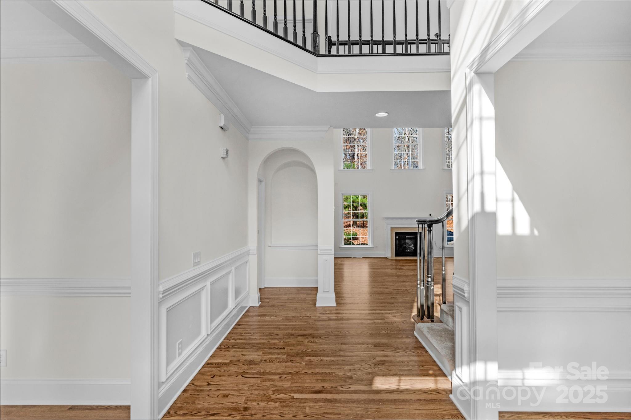 1300 Longleaf Court Weddington, NC 28104 - Photo 5 of 48 a view of entryway and hall with wooden floor
