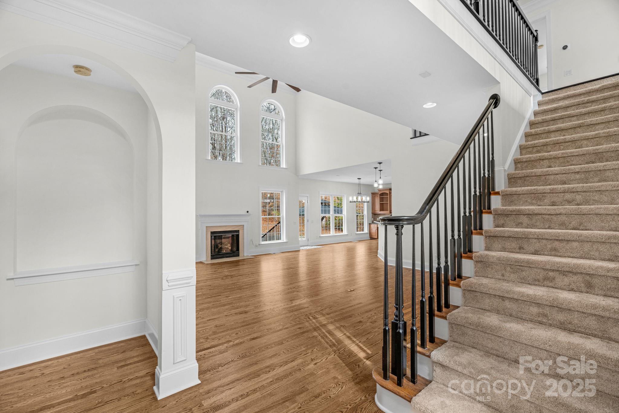 1300 Longleaf Court Weddington, NC 28104 - Photo 9 of 48 a view of entryway and hall with wooden floor