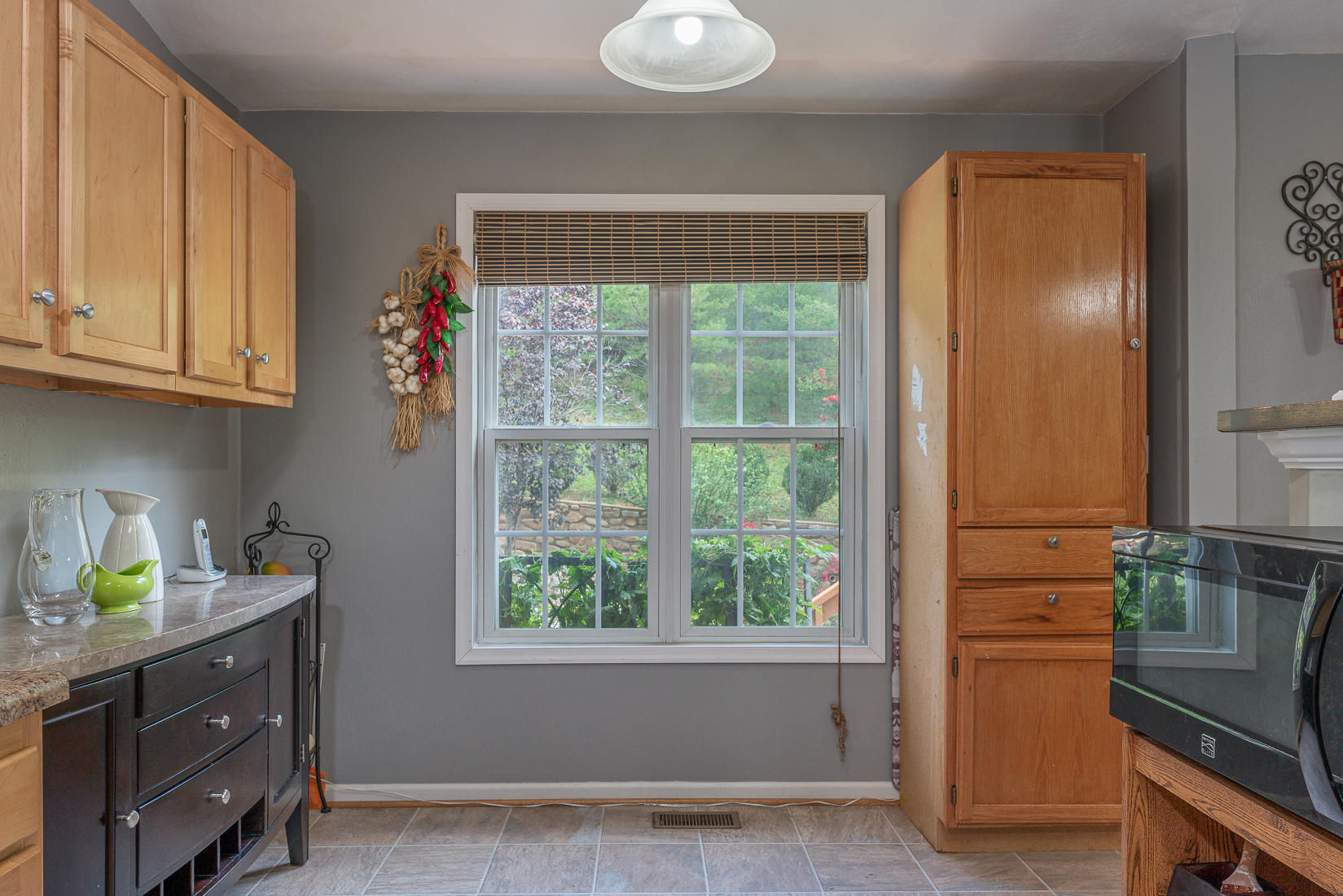4245 Daugherty Road Salem, VA 24153 - Photo 13 of 44 a kitchen with a refrigerator and window