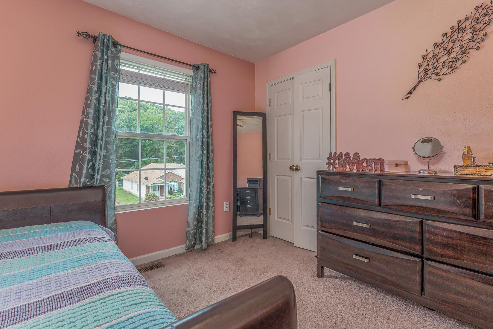 4245 Daugherty Road Salem, VA 24153 - Photo 19 of 44 a living room with furniture and a window