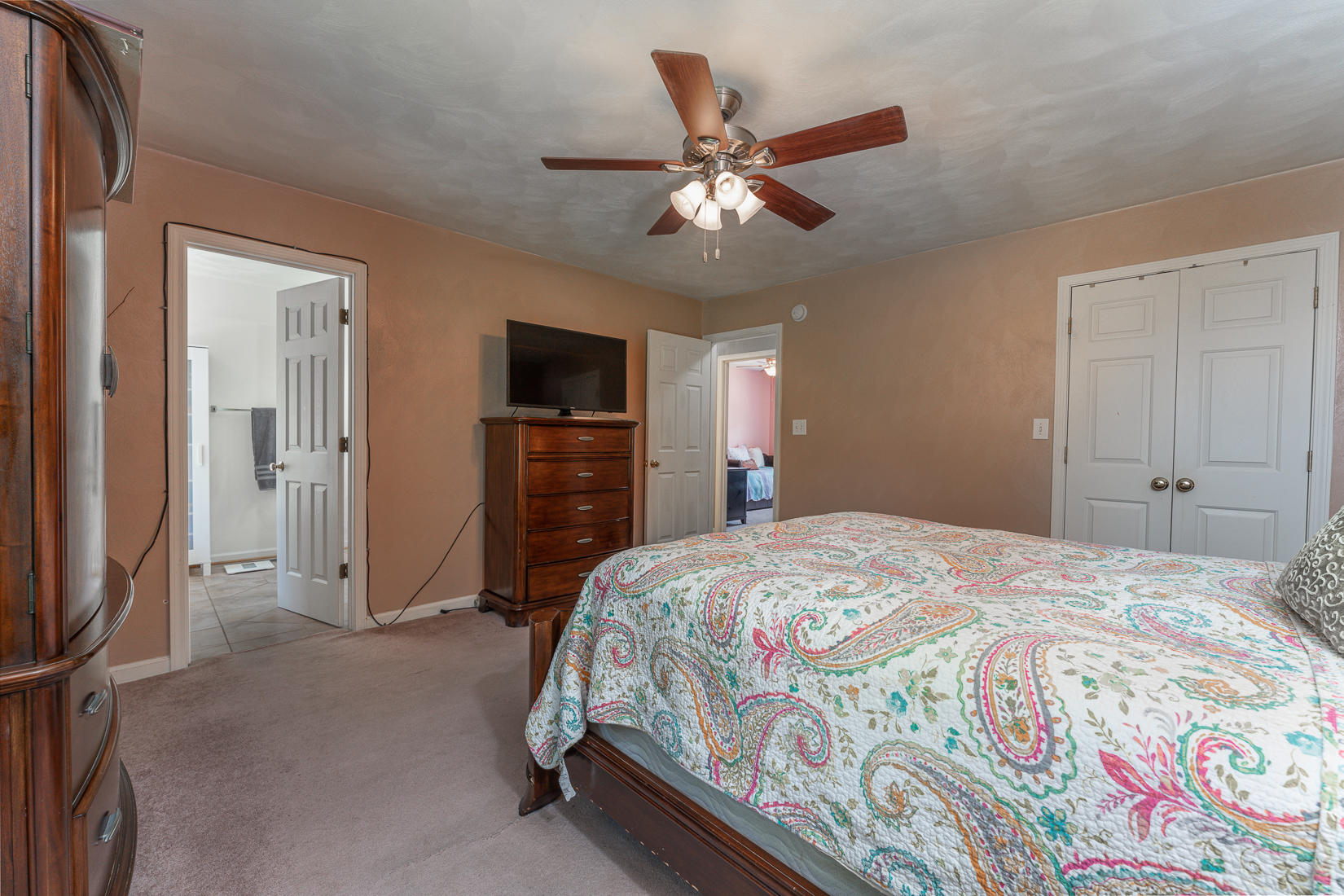 4245 Daugherty Road Salem, VA 24153 - Photo 23 of 44 a bedroom with a bed and a flat screen tv