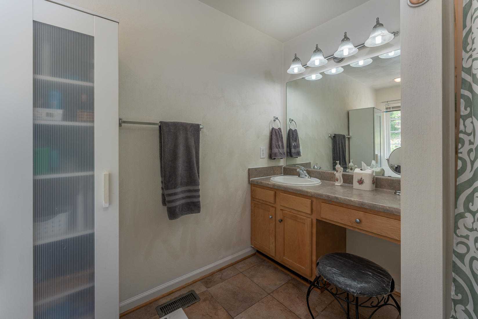 4245 Daugherty Road Salem, VA 24153 - Photo 24 of 44 a bathroom with a double vanity sink and a mirror