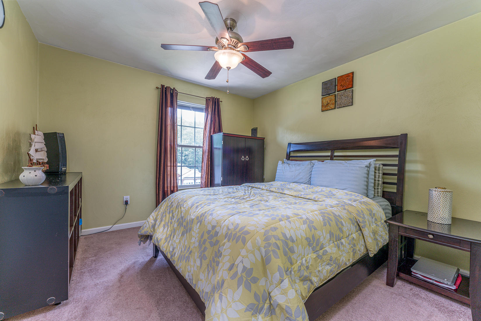 4245 Daugherty Road Salem, VA 24153 - Photo 27 of 44 a bedroom with a large bed and a chandelier